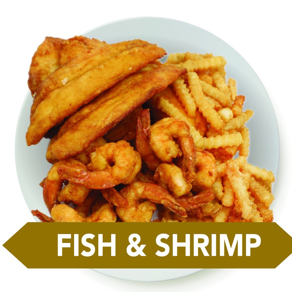 A white plate holds fried fish fillets, crispy shrimp, and crinkle-cut french fries.