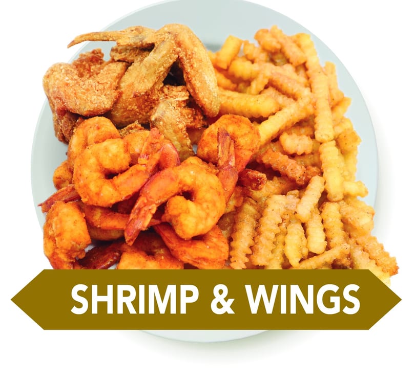 A plate of crispy fried chicken wings, seasoned shrimp, and crinkle-cut french fries.